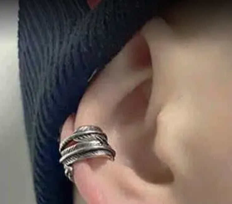 Manchette d'oreille en plumes