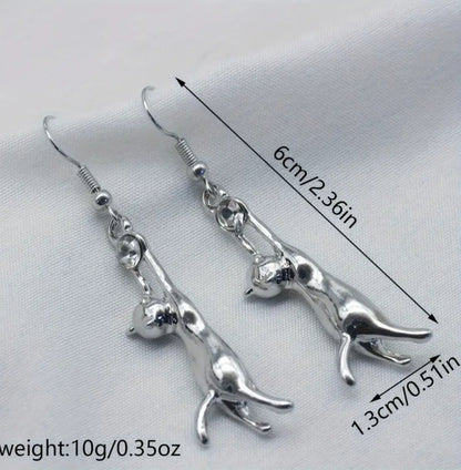 Cat chasing diamonte ball earrings