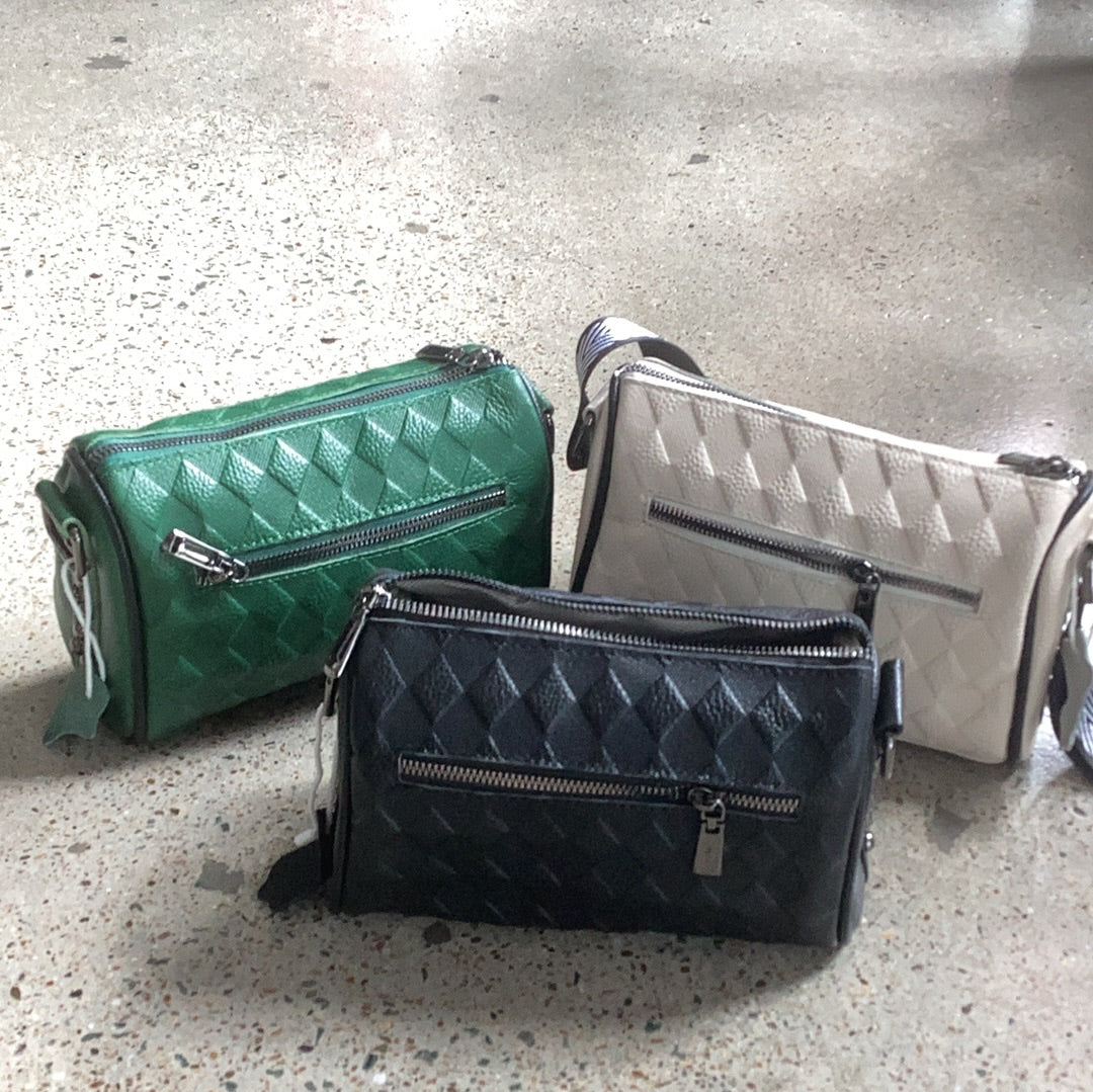 Embossed leather handbags