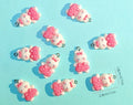Breloque lapin en robe rose