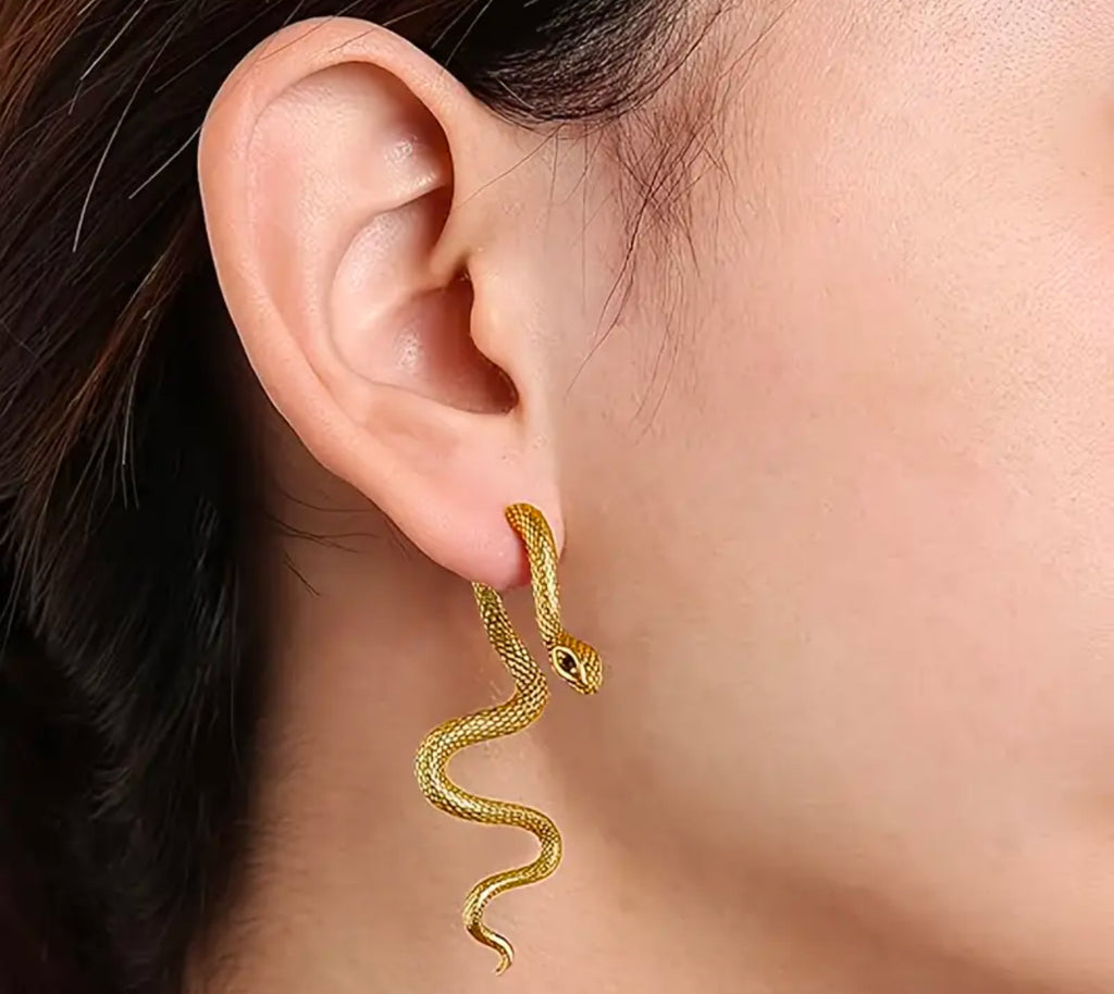 Boucles d'oreilles serpents en or aux yeux noirs