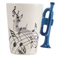 240ml ceramic music mug with blue trumpet shaped handle and musical notes