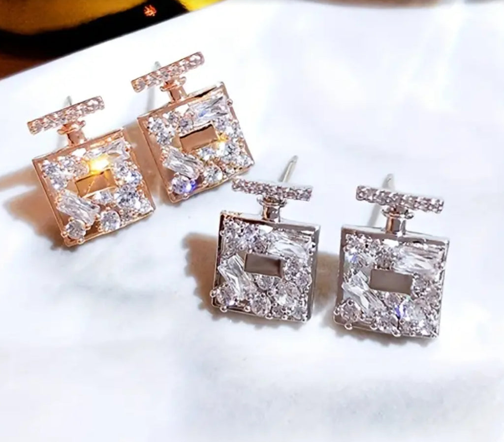 Boucles d'oreilles à tige en forme de bouteille de parfum (or ou argent)