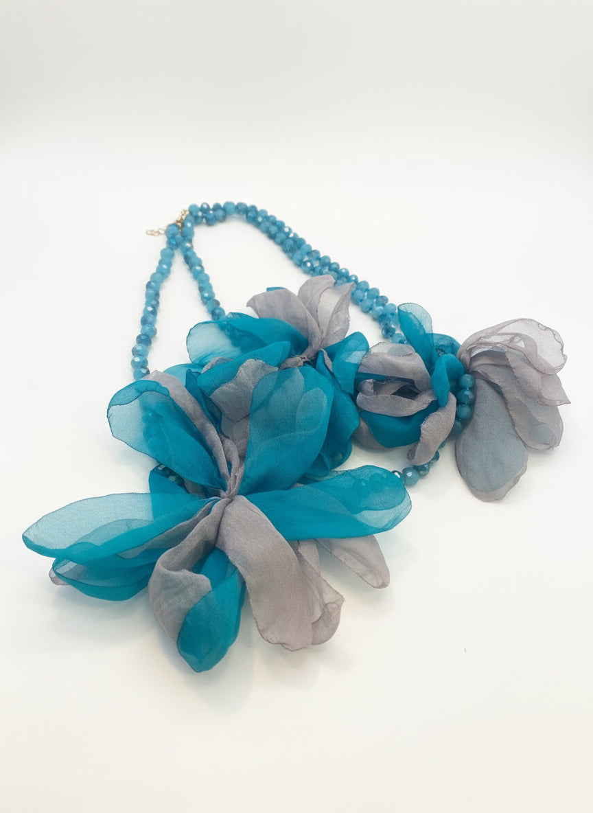 Blue beaded necklace with flowers