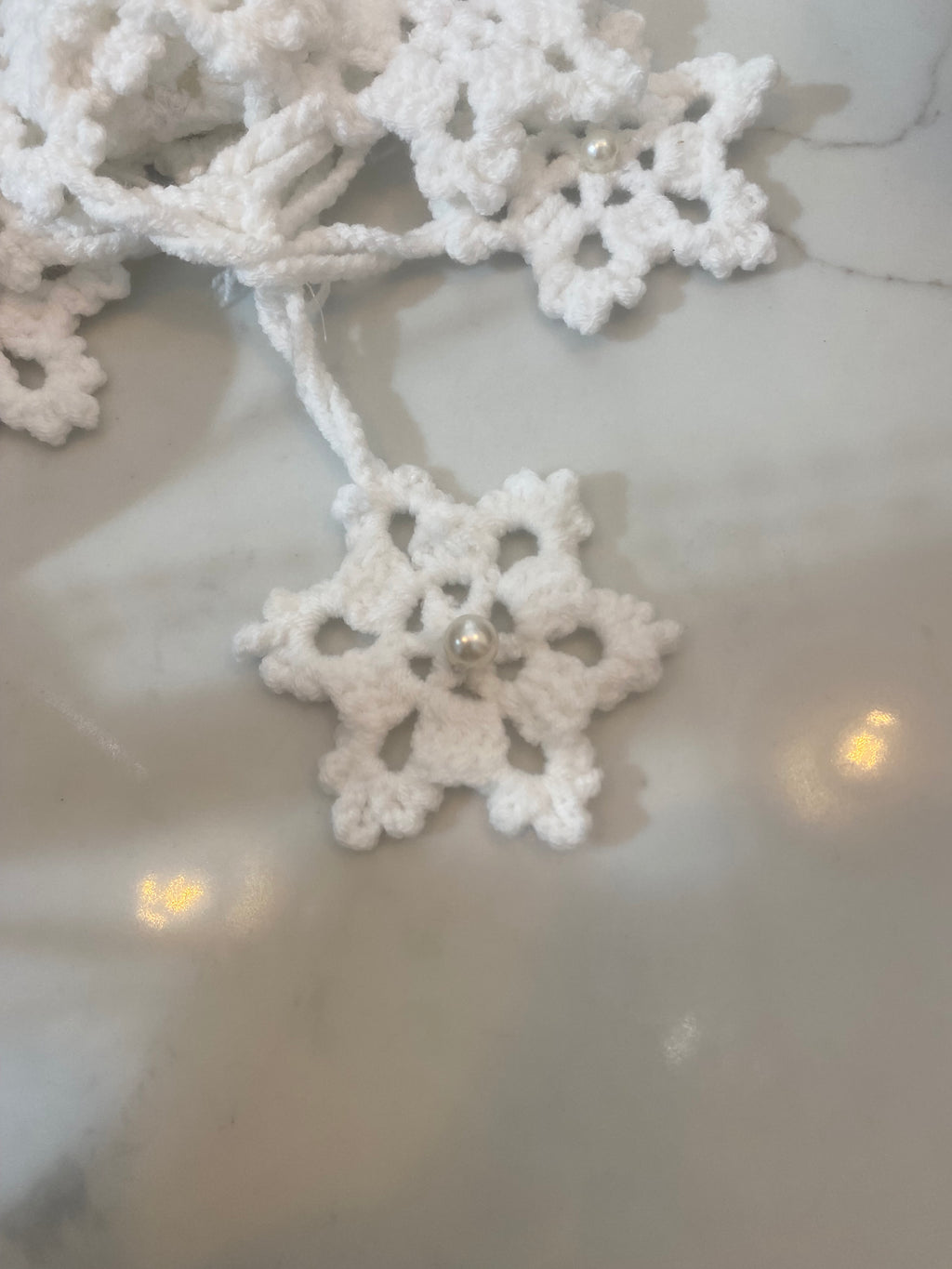 Décoration de Noël en forme de flocon de neige au crochet