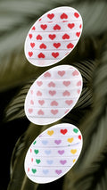 Coeurs sur lacets blancs (couleurs variées)