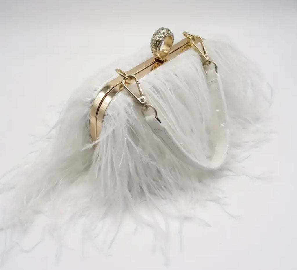 Sac en plumes d'autruche blanches