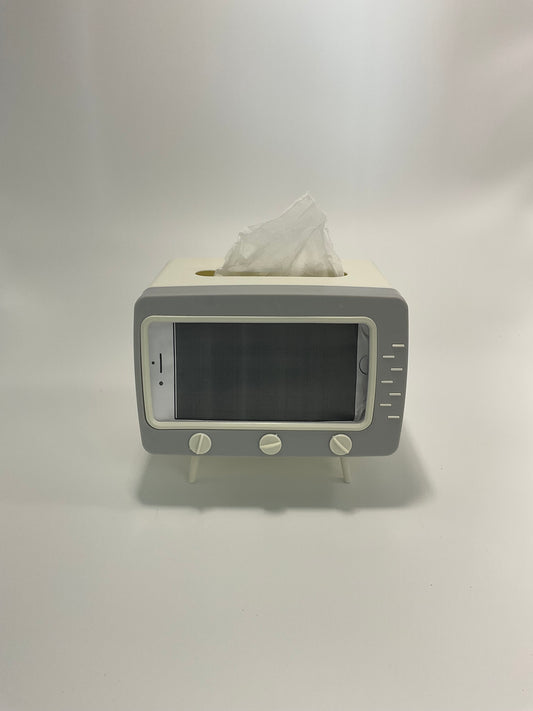 Television tissue holder and mobile phone holder.