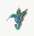 Broche colibri en diamant bleu