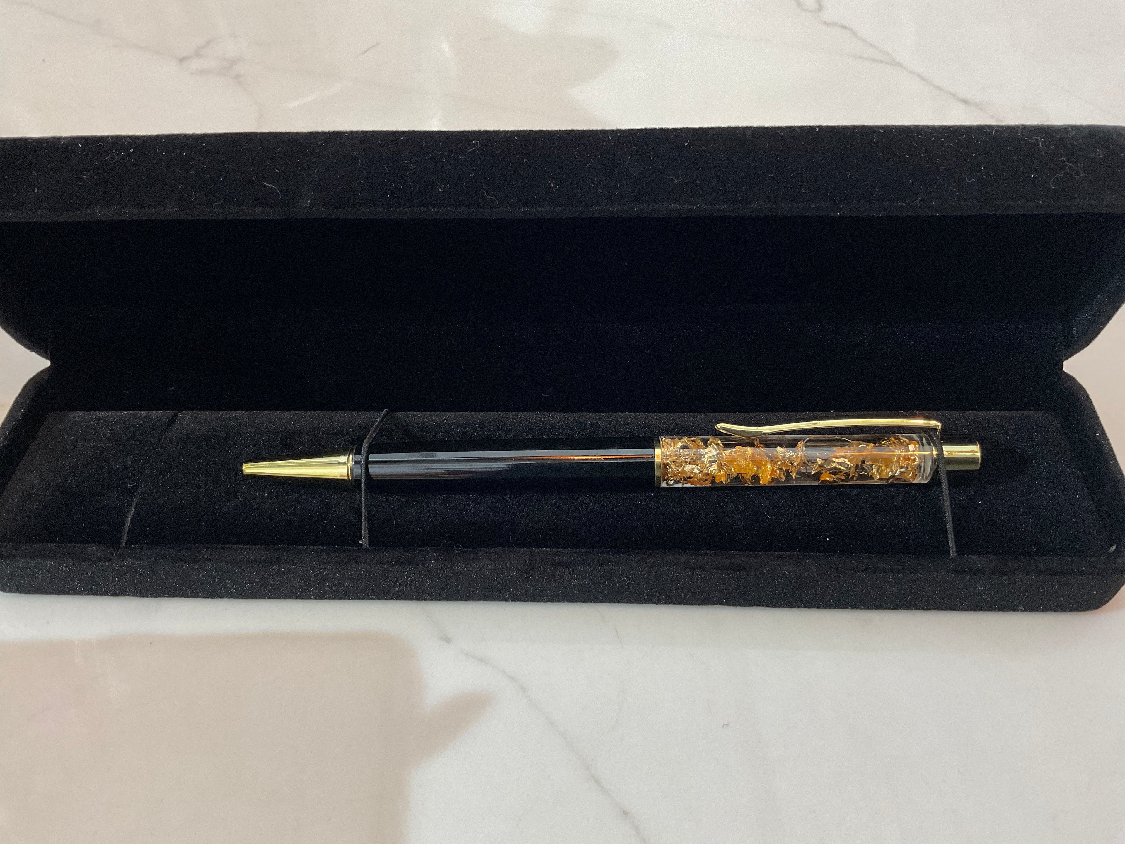 Stylo à bille à poussière d'or flottante