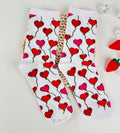 Chaussettes blanches avec ballons en forme de cœur rouge