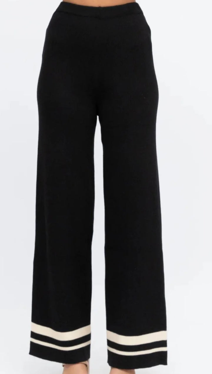 Pantalon en tricot noir à rayures