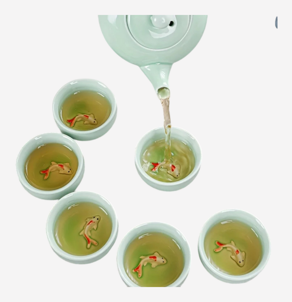 Théière en céramique et 6 tasses en forme de poisson rouge