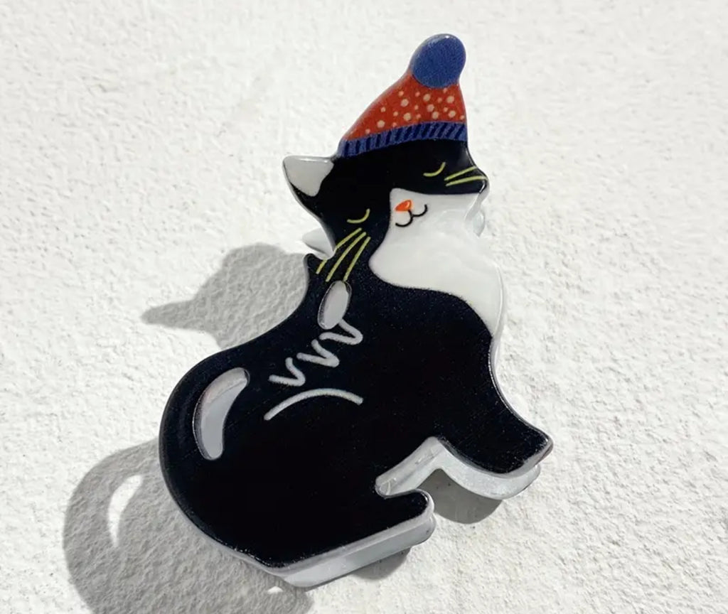 Pince à cheveux griffe de chat noir de Noël