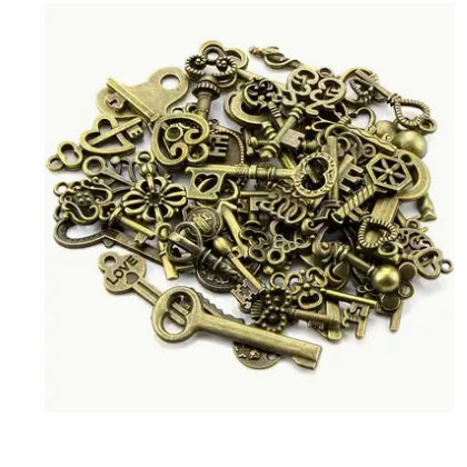 Vintage key charm