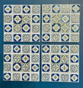 Lot de 4 sous-verres géométriques en carreaux bleus et dorés