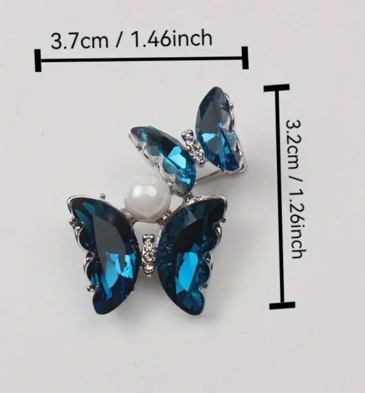 Broche papillons bleus