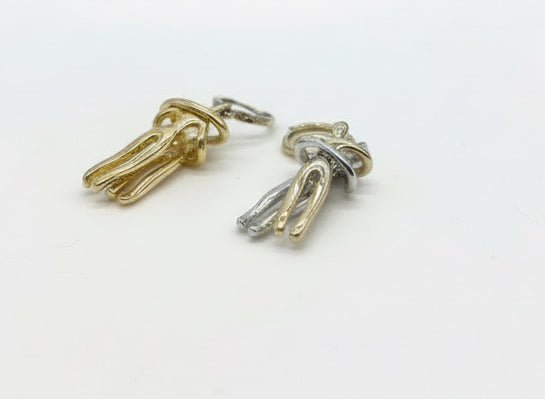 Couple embracing earrings