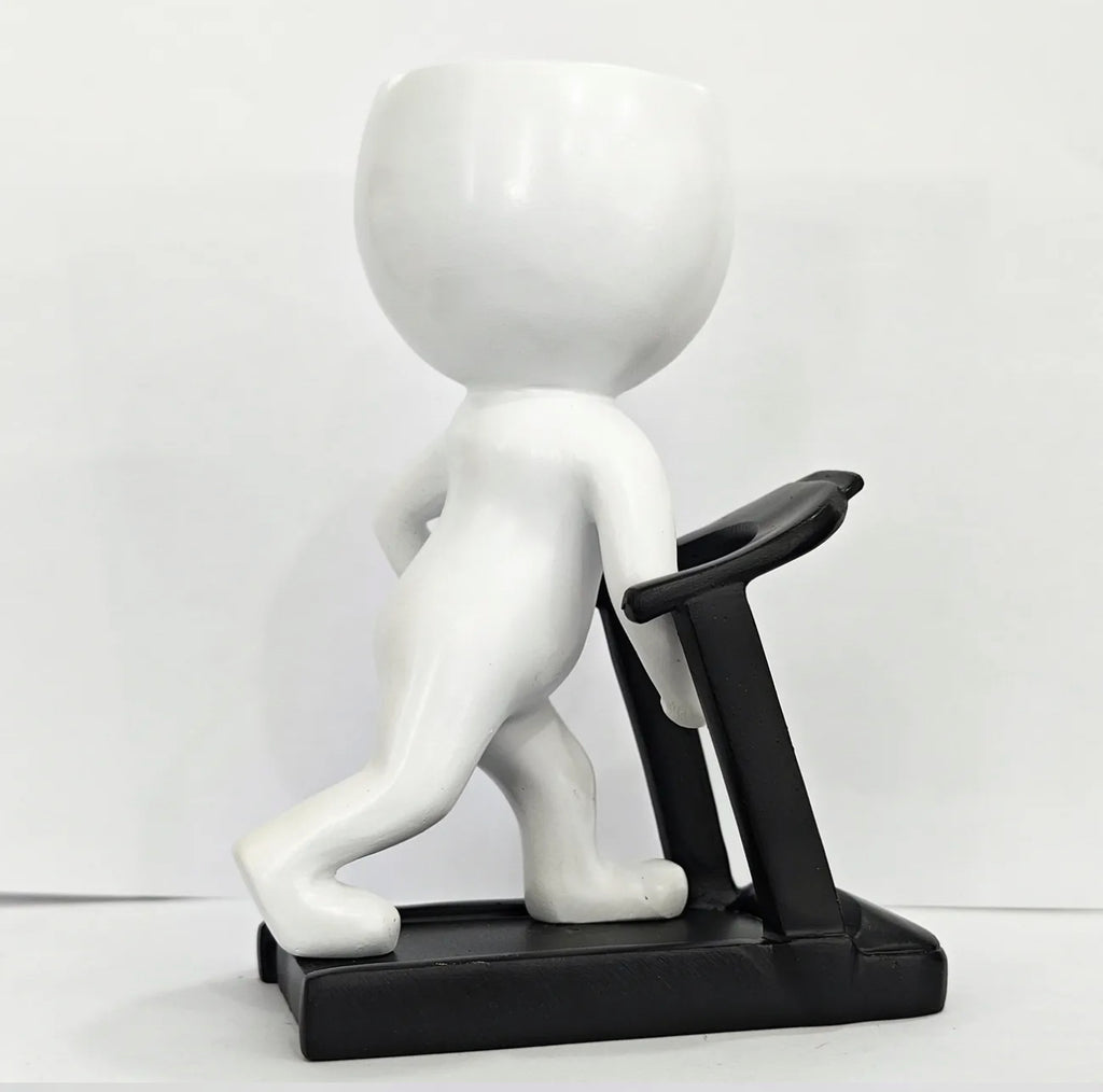 Pot de fleurs blanc représentant un joggeur sur un tapis roulant