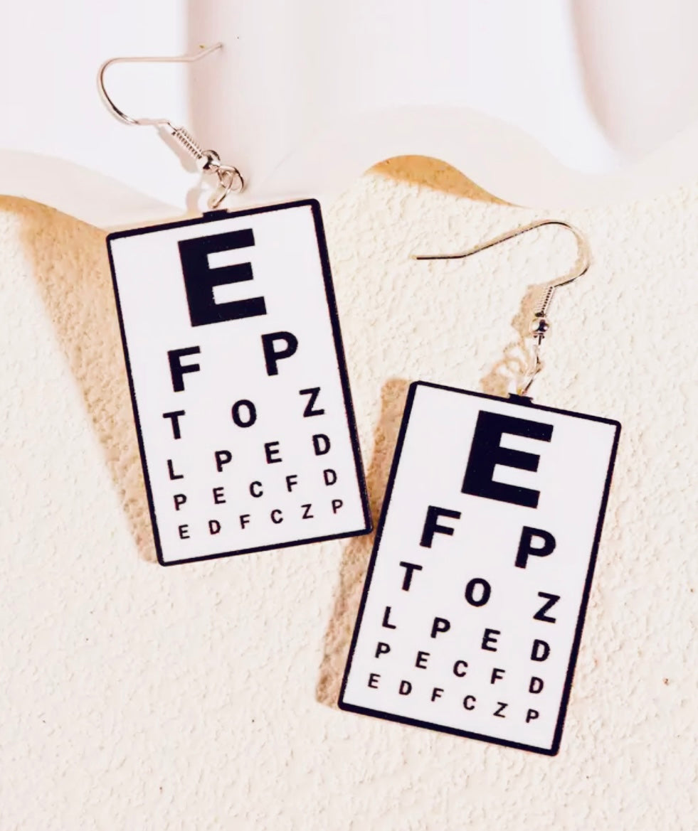 Boucles d'oreilles avec échelle d'acuité visuelle