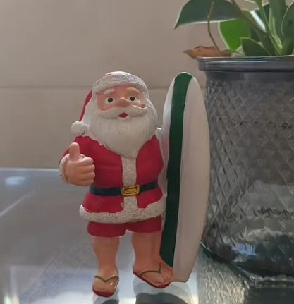 Surfing Santa figurine