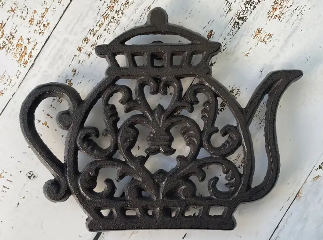 Dessous de plat en fonte en forme de théière