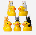 Miniature Cat on Yellow Duck Figurine