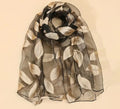 Foulard de soirée noir à feuilles dorées