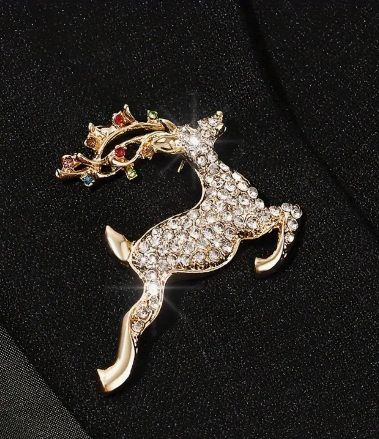 Broche renne en or et diamants