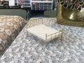 Miniature gold bed frame