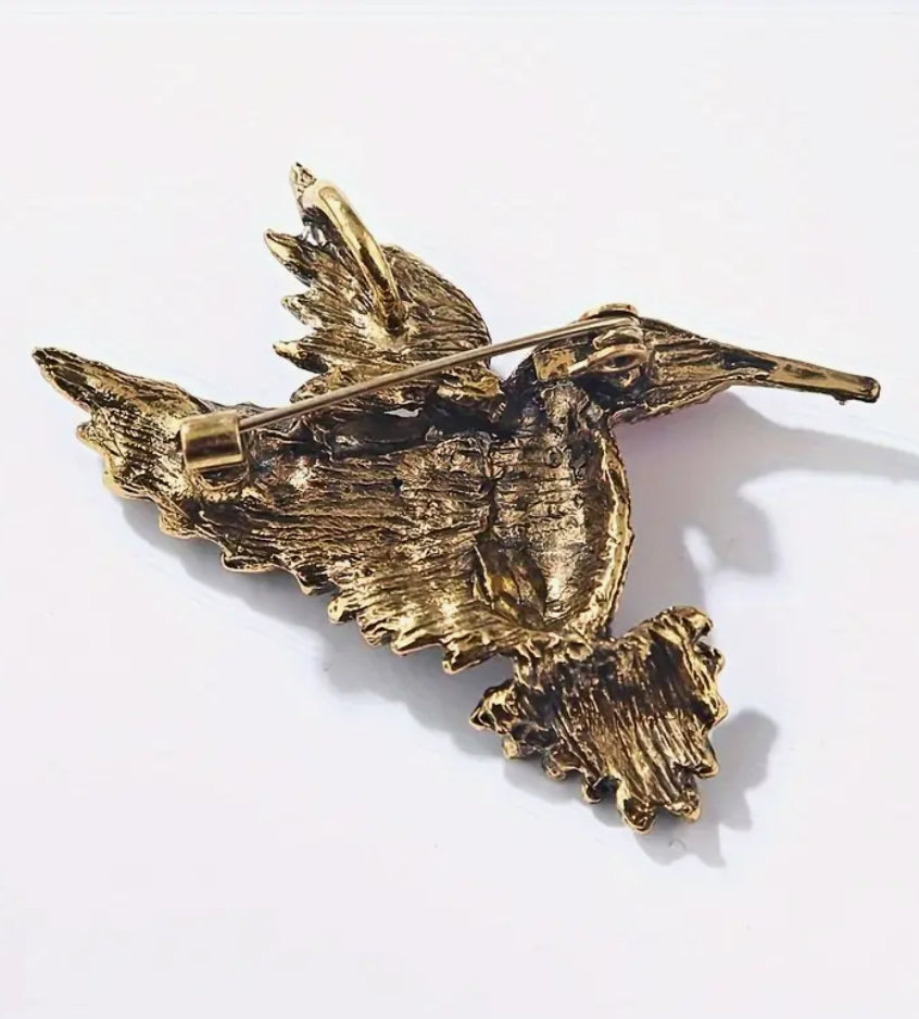Broche colibri en diamant bleu