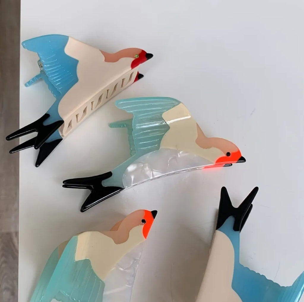 Pince à cheveux en forme de griffe d'oiseau