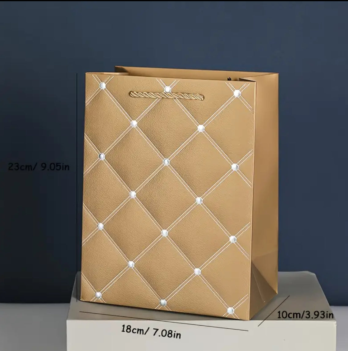 Sac cadeau doré