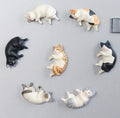 Figurine de chat endormi
