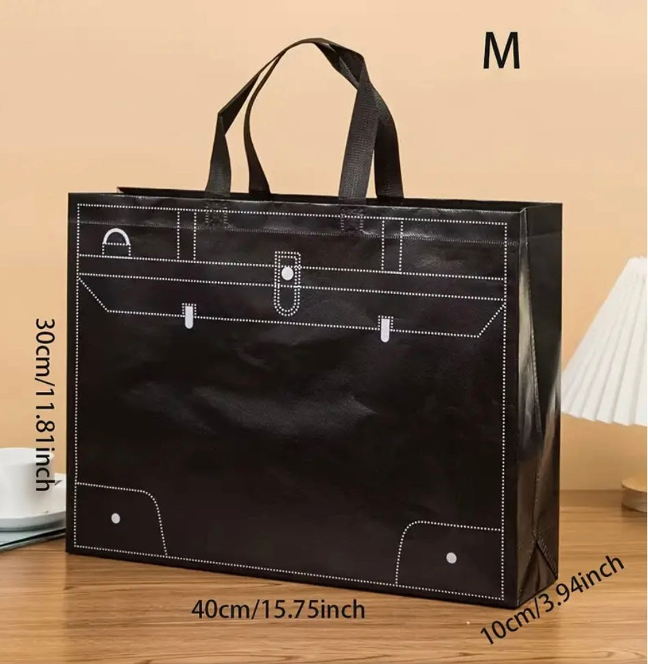 Sacs cadeaux en nylon noir de taille moyenne