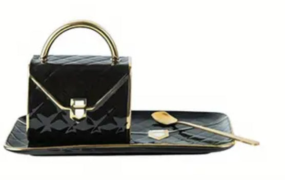 Tasse et soucoupe noires pour sac à main