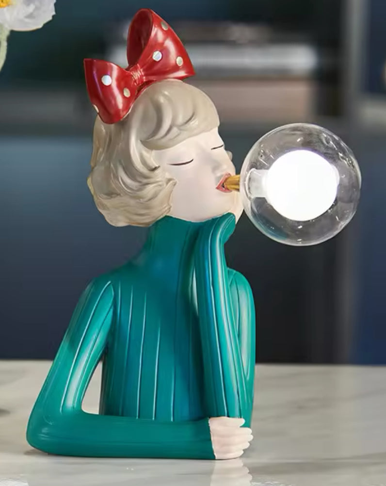 Lampe fille chewing-gum avec un nœud à pois rouges