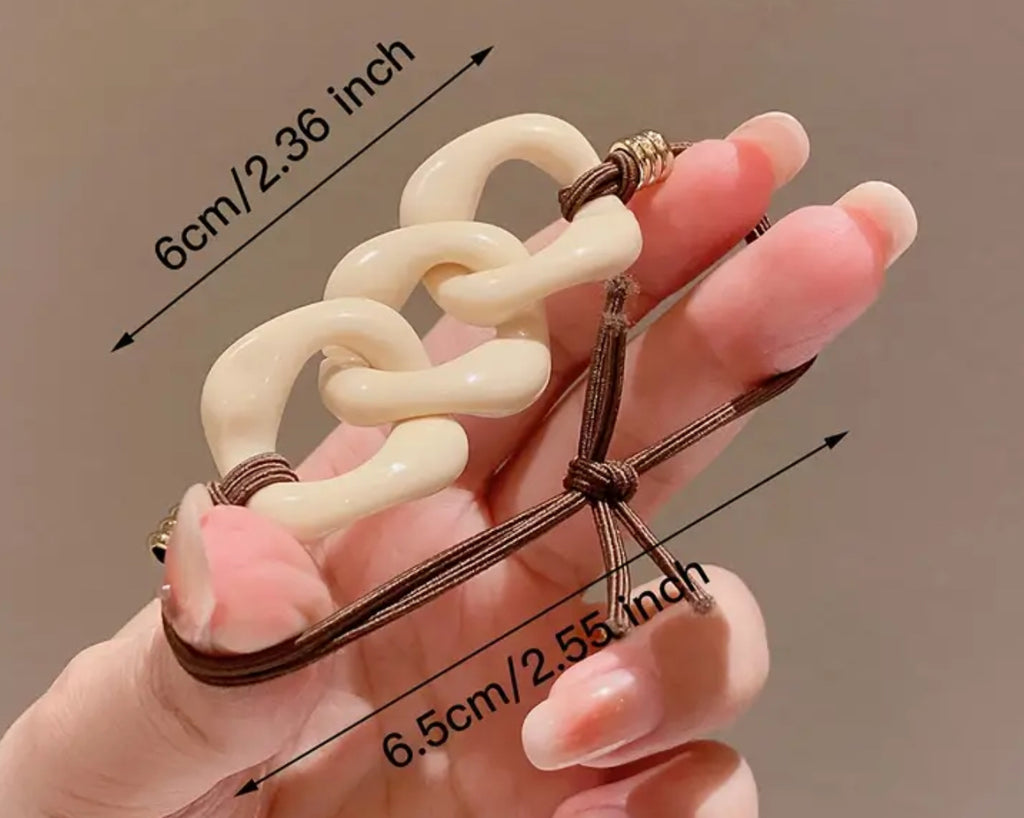 Élastique à cheveux en plastique