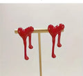 Melted red heart stud earrings