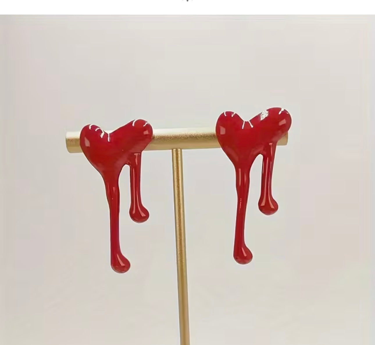 Melted red heart stud earrings