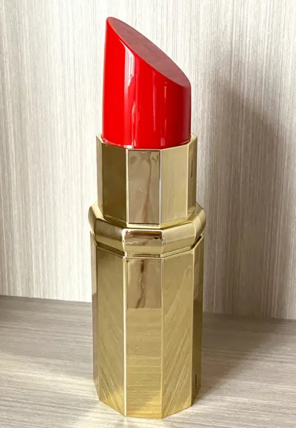 Sac à main rouge à lèvres doré