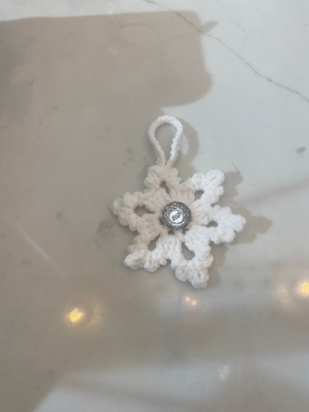 Décoration de Noël en forme de flocon de neige au crochet