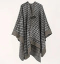 Poncho noir à grands carreaux