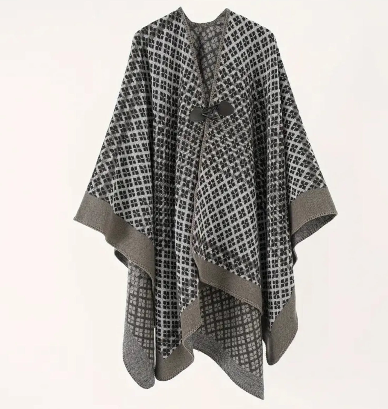 Poncho noir à grands carreaux