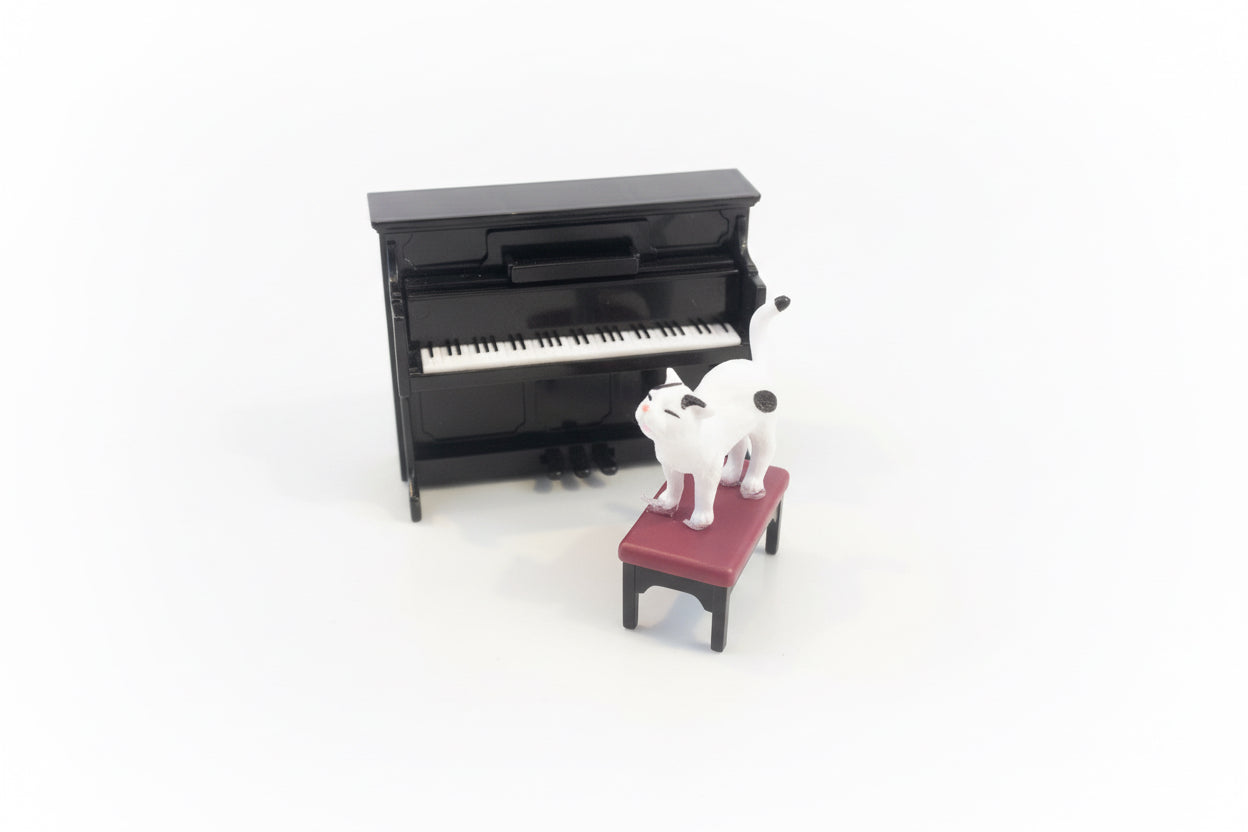 Cat figurine with Piano
