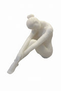 Abstract seated reconstituted stone figure