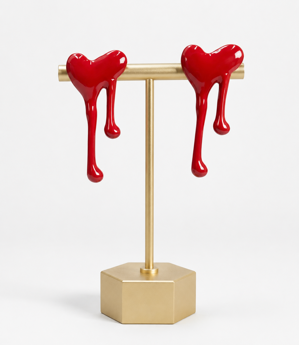 Melted red heart stud earrings