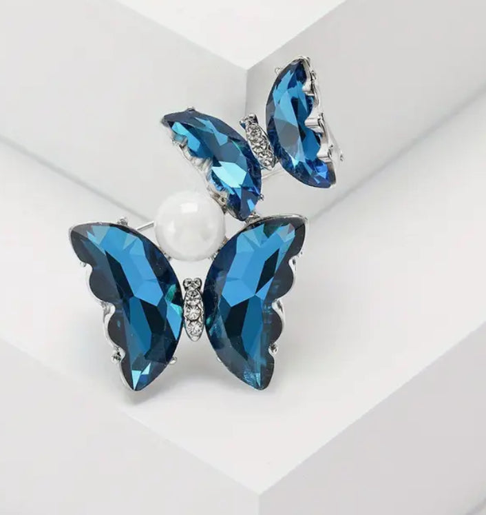Broche papillons bleus