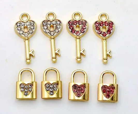 Gold lock and key charms with pink or white diamonte