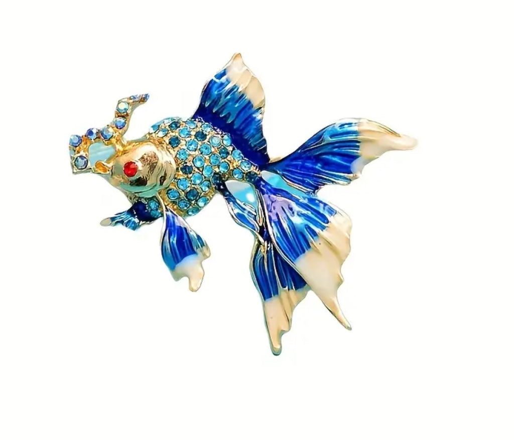 Broche poisson en or et diamant bleu